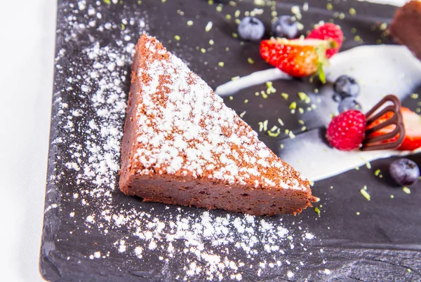 Brownie Decorated Powder Sugar Chocolate Some Berry Fruit — Stock Photo, Image