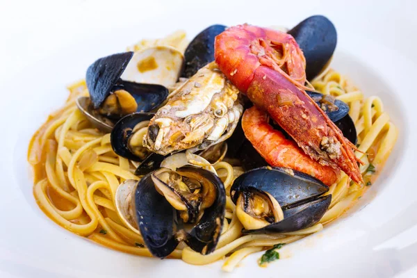 Pasta with seafood Dinner Dish on a the table