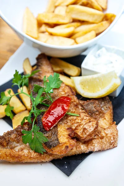 British Traditional fish and chips and tartar sauce