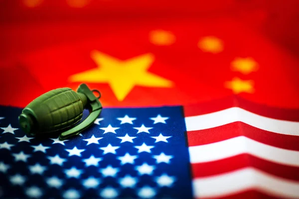 China-US trade war concept - Military facilities on the flag of China and the United States