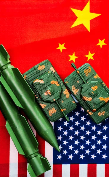 China-US trade war concept - Military facilities on the flag of China and the United States