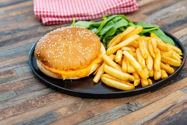 Cheese burger - American cheese burger with Golden French fries