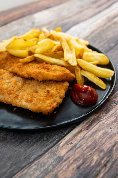 British Traditional fish and chips and tartar sauce