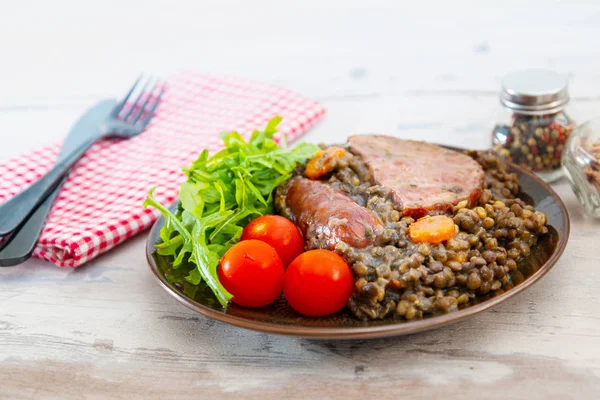 Green lentils with smoked pork sausage smoked choice, carrots and onions