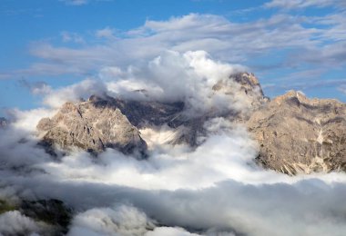 panoramic view of the Sexten dolomites mountains or Dolomiti di Sesto from Carnian Alps mountains, Italy clipart