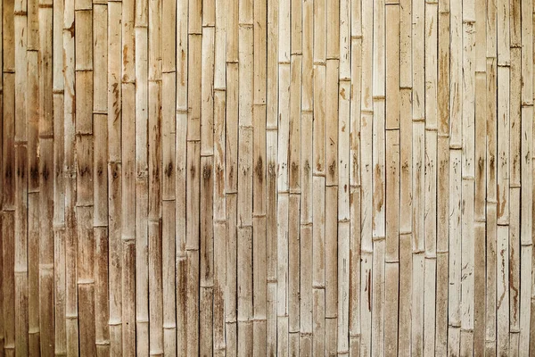 Oude bamboe verschoten achtergrond hek — Stockfoto
