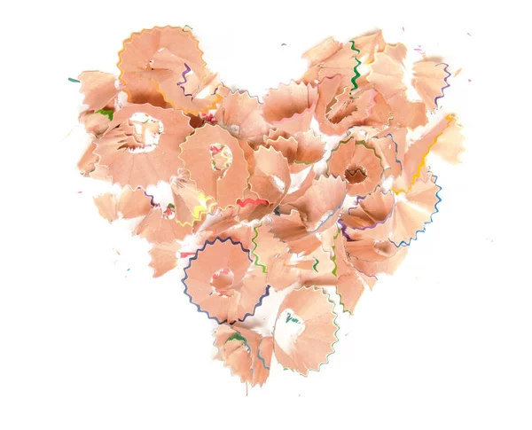 Kalp Şekli Beyaz Arka Plan Üzerinde Renkli Kalem Shapener Çöp — Stok fotoğraf