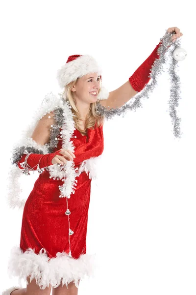 Hübsches Junges Mädchen Weihnachtsmannkleid Hängt Die Christbaumkugeln Auf — Stockfoto