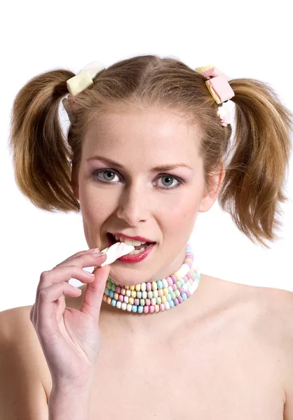 Pretty Blond Girl Candy Necklace Biting Candy — Stockfoto