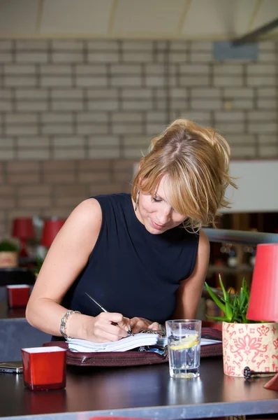 Pretty Blond Girl Updating Her Agenda While Sitting Bar — Stock Photo, Image