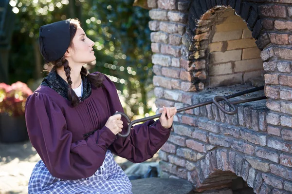 Young Farm Woman Checking Bread Oven — Stock Photo, Image