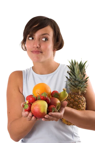 Bonita Morena Sosteniendo Una Pila Fruta Sus Manos Sobre Fondo — Foto de Stock