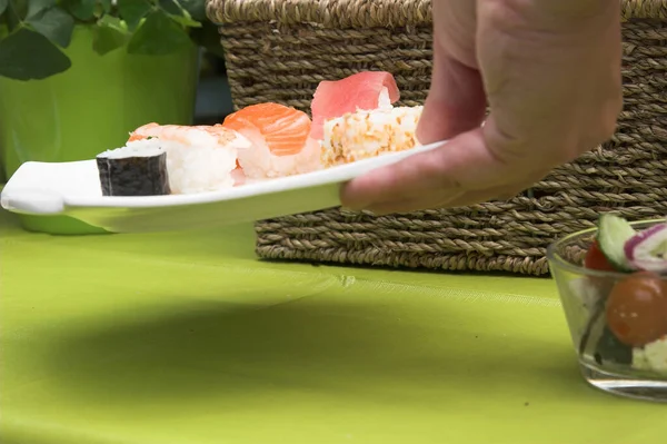 Hand Reaching Table Sushi Picnic Lunch — Stock Photo, Image