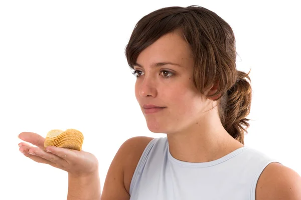 Bonita Morena Sosteniendo Una Pila Papas Fritas Mano Para Simbolizar — Foto de Stock