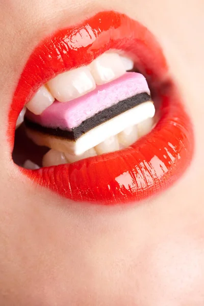 Bright Red Lips Candy Her Teeth — Stock Photo, Image
