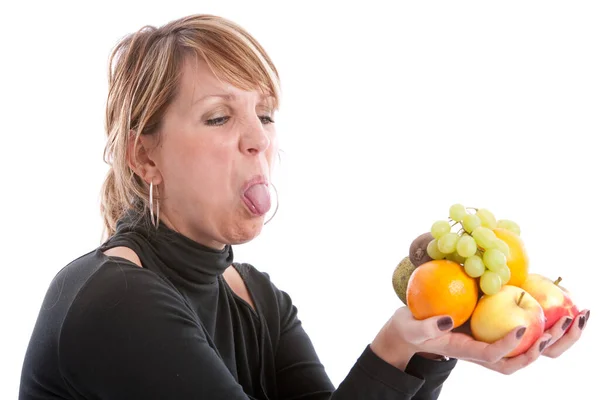 Blonde Woman Studio Different Fruits Showing Tongue — Stock Photo, Image