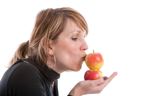 Mid Adult Blonde Woman Studio Kissing Apples — Stock Photo, Image