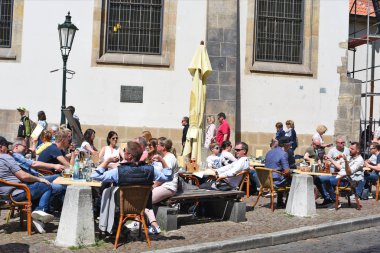 PRAGUE, CZECH REPUBLIC  May 1, 2017: people at street cafe 