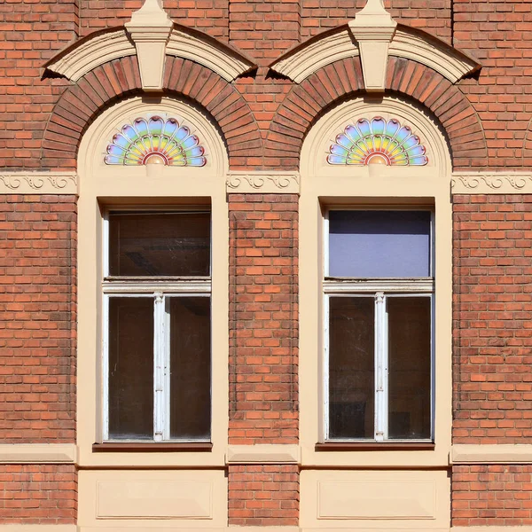 old wooden window with windows and a wall