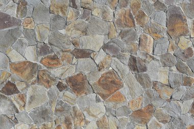 Çatlamış bir taştan bir duvar parçası.