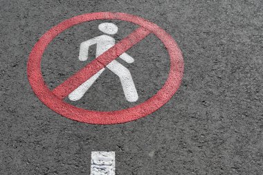 road sign on a pedestrian bridge.
