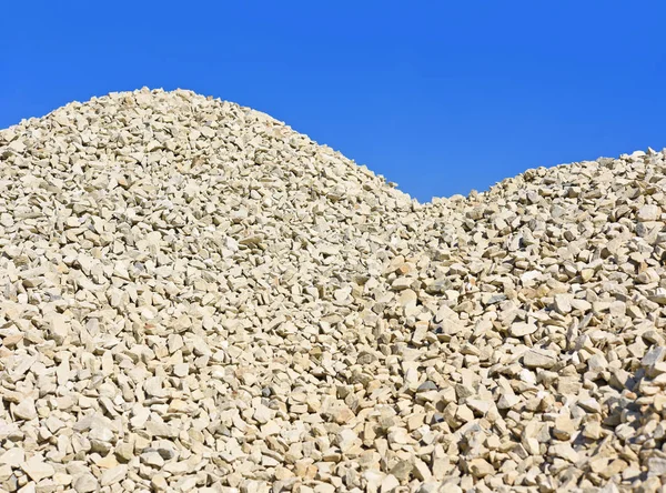 pile of stones against blue sky