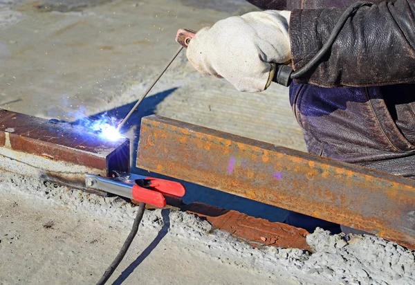 Man Welding Metal Construction — Photo