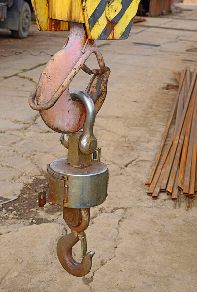 Scales crane on industrial background 