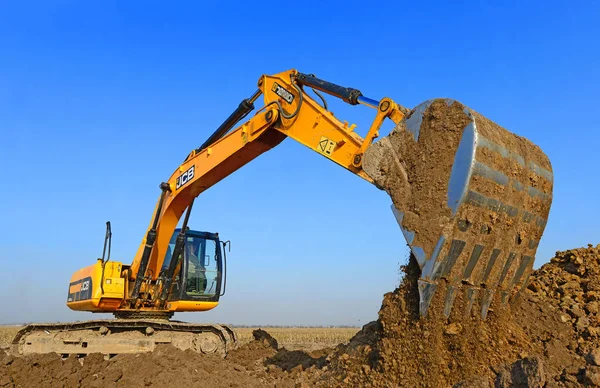 Graafmachine Aan Het Werk Een Bouwplaats — Stockfoto