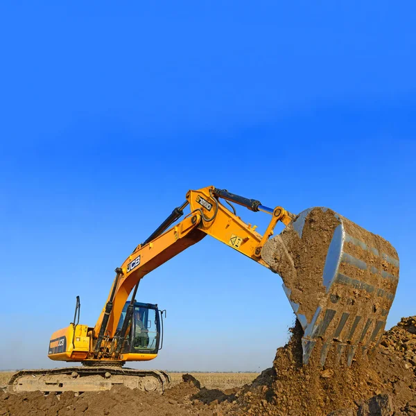 Grävmaskiner Som Arbetar Byggarbetsplats — Stockfoto