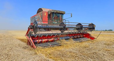 agricultural machinery working at rural field