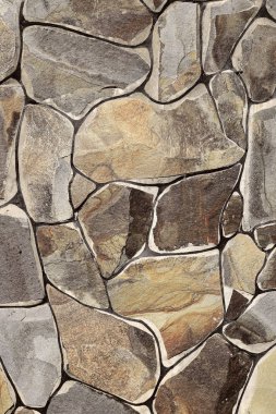 Çatlamış bir taştan bir duvar parçası.