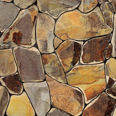 Çatlamış bir taştan bir duvar parçası.