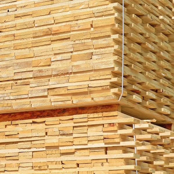 stack of wood planks in the warehouse