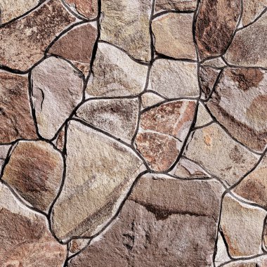 Çatlamış bir taştan bir duvar parçası.