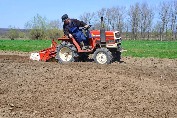 Man Tractor Plowing Field — Stock Fotó
