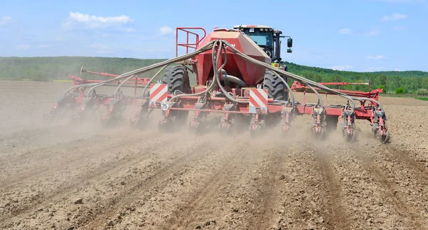 stock image tractor plowing the field