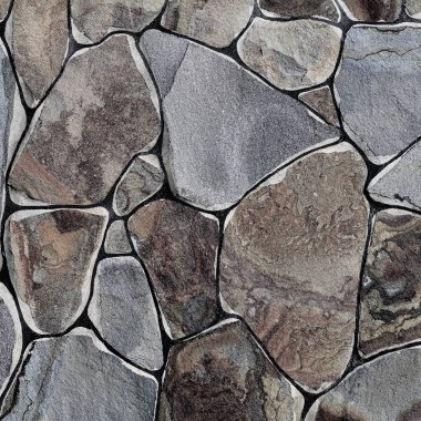 Çatlamış bir taştan bir duvar parçası.