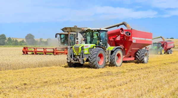 Overloading Grain Harvester Grain Tank Tractor Trailer Royalty Free Stock Photos