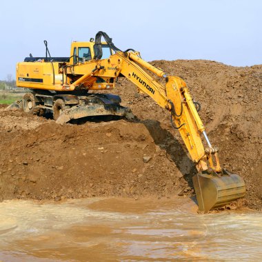 excavator working at the field