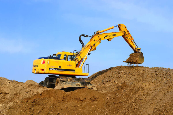 excavator working at the field