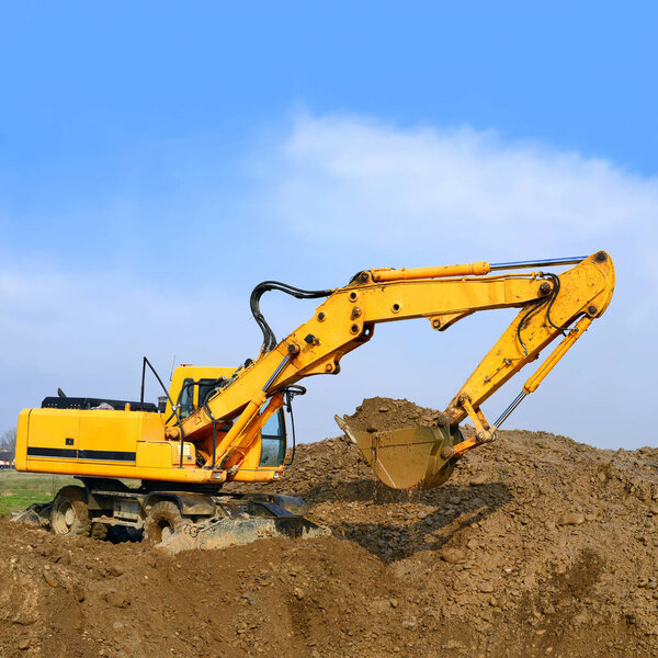 excavator working at the field