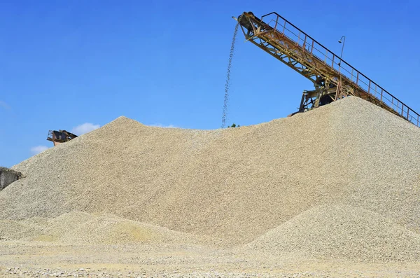 A pile of washed river gravel