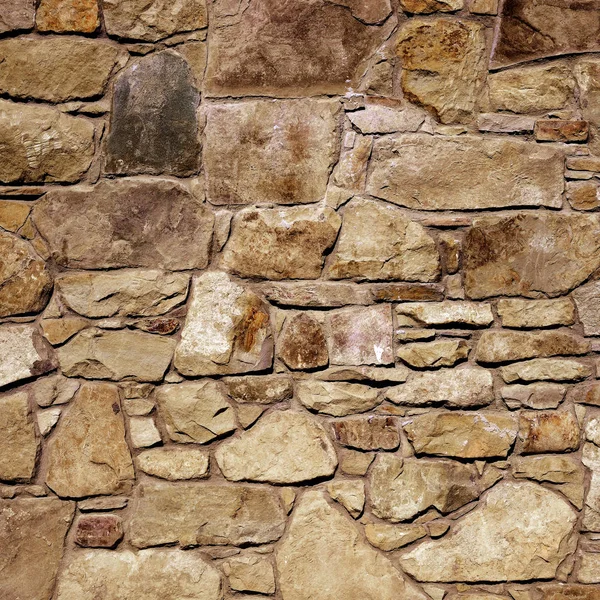 Çatlamış Bir Taştan Bir Duvar Parçası — Stok fotoğraf