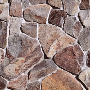 Çatlamış bir taştan bir duvar parçası.