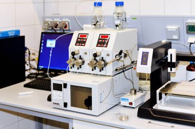 PRAGUE, December 3, 2016: Semi-preparative chromatograph with modular pumps, UV-detector and fraction collector. HPLC. Institute of Organic and Biochemistry Academy of Sciences the Czech Republic.