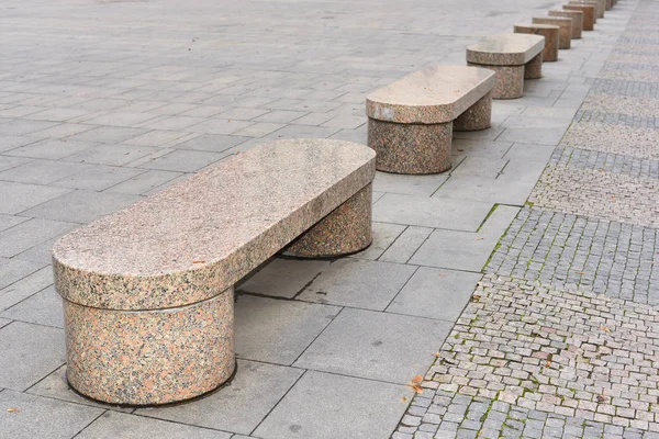 Stone benches in the town square