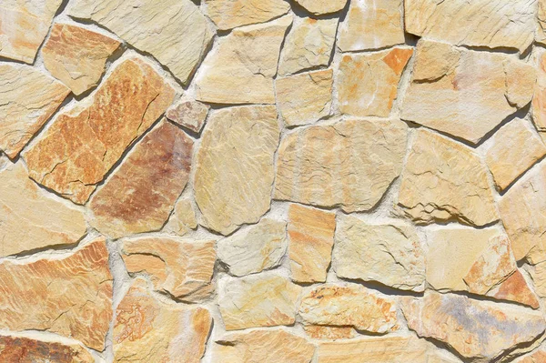 Ezilmiş taş duvar kaplama. Doku.