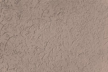 Duvarın bir parçası. Kaplanmış alçı.