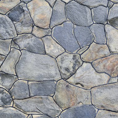 Çatlamış bir taştan bir duvar parçası.